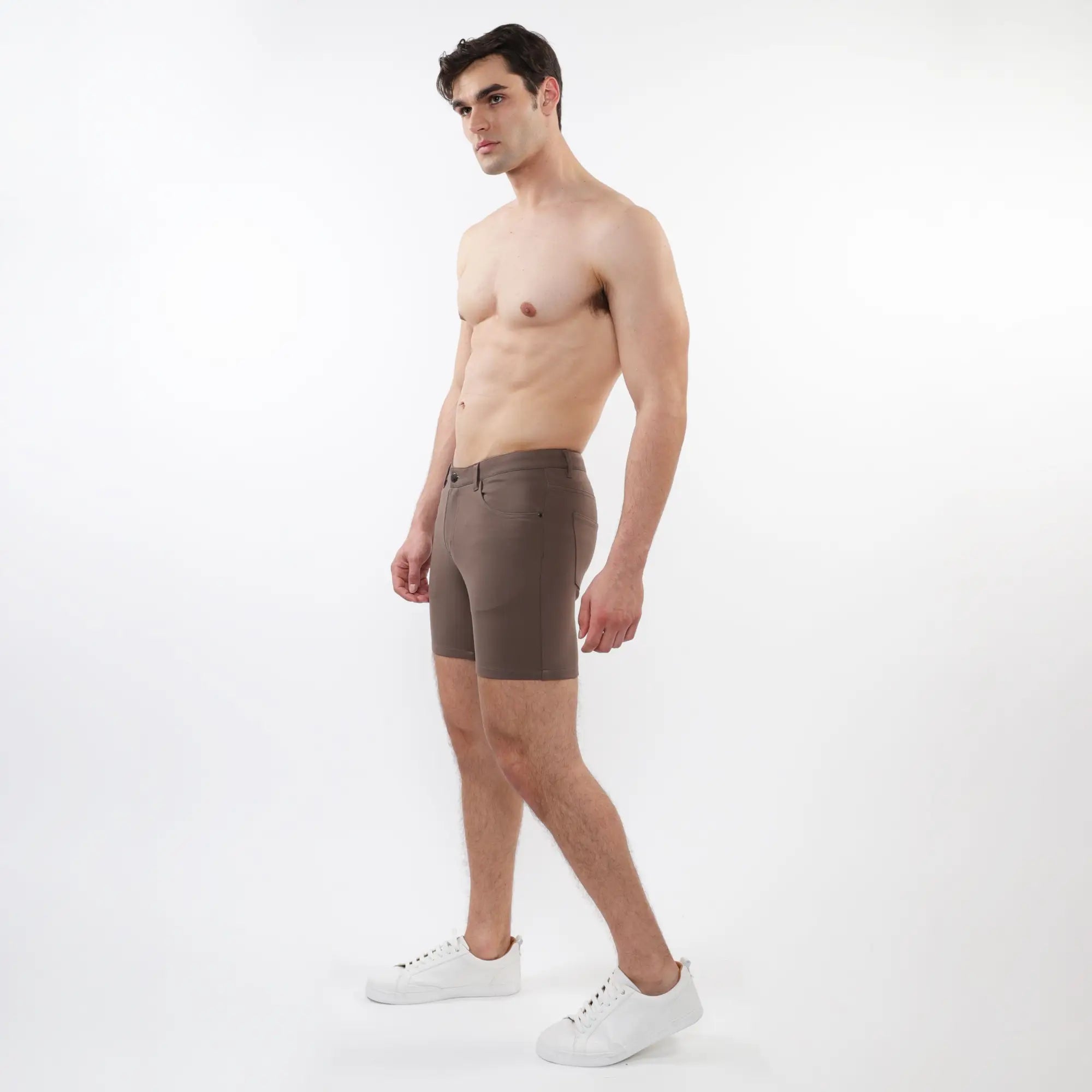 Brown stretch knit short with form-fitting design and subtle stitching details in soft knit fabric