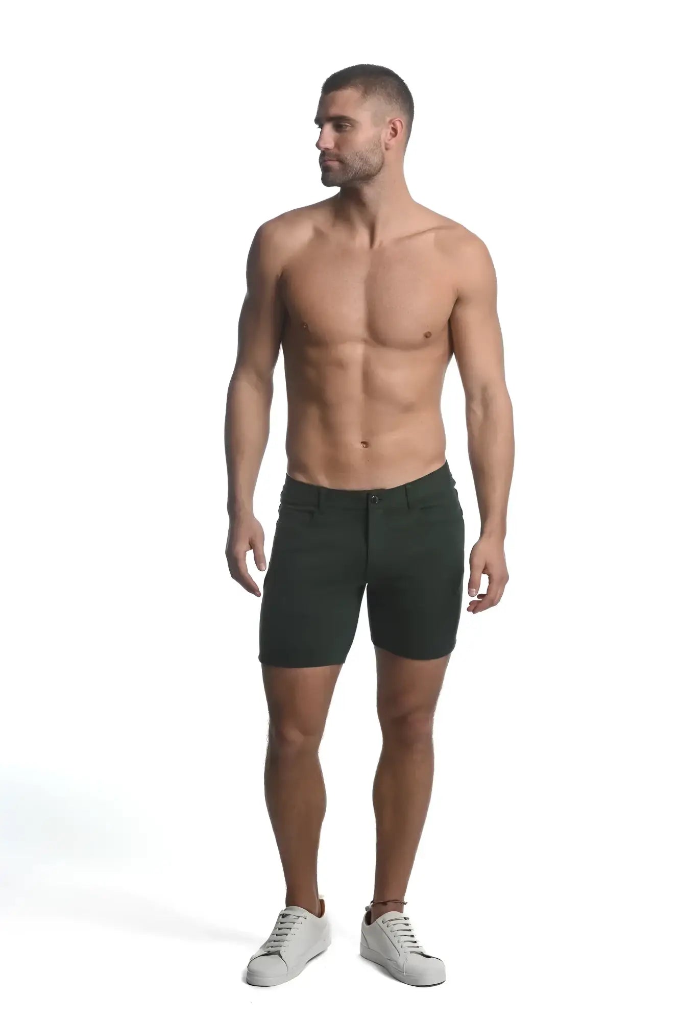 Dark green slim-fit stretch knit chino shorts with classic five-pocket design for casual wear