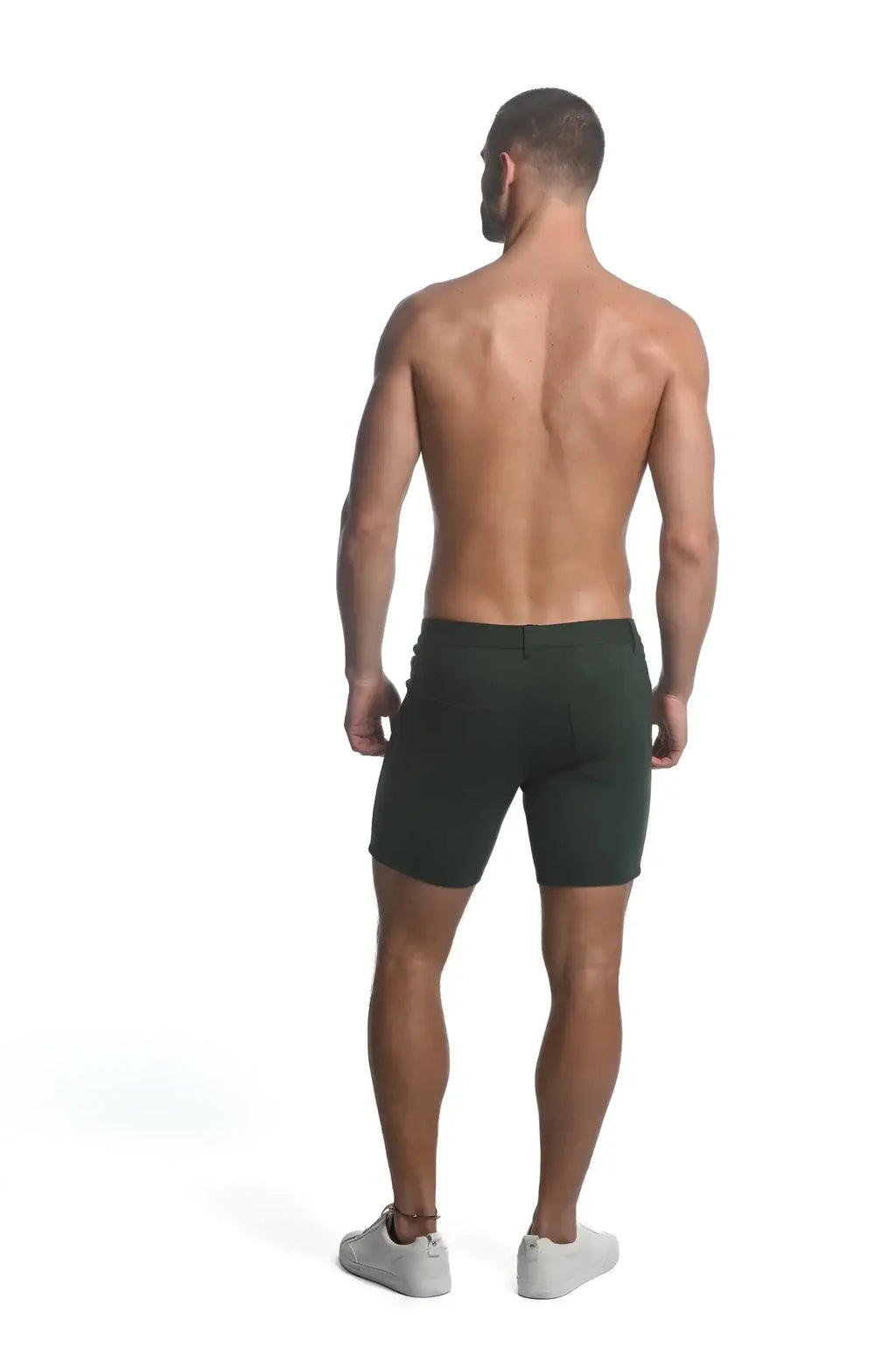 Dark green slim-fit stretch knit shorts made of smooth fabric for comfortable everyday wear