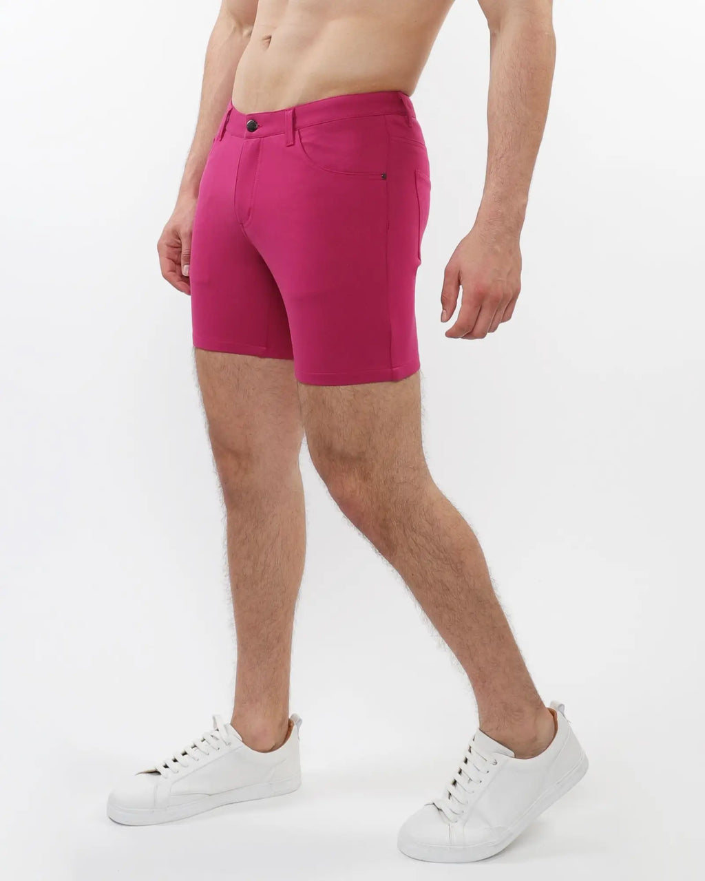 Fuchsia stretch knit short featuring form-fitting design with subtle stitching details for active wear