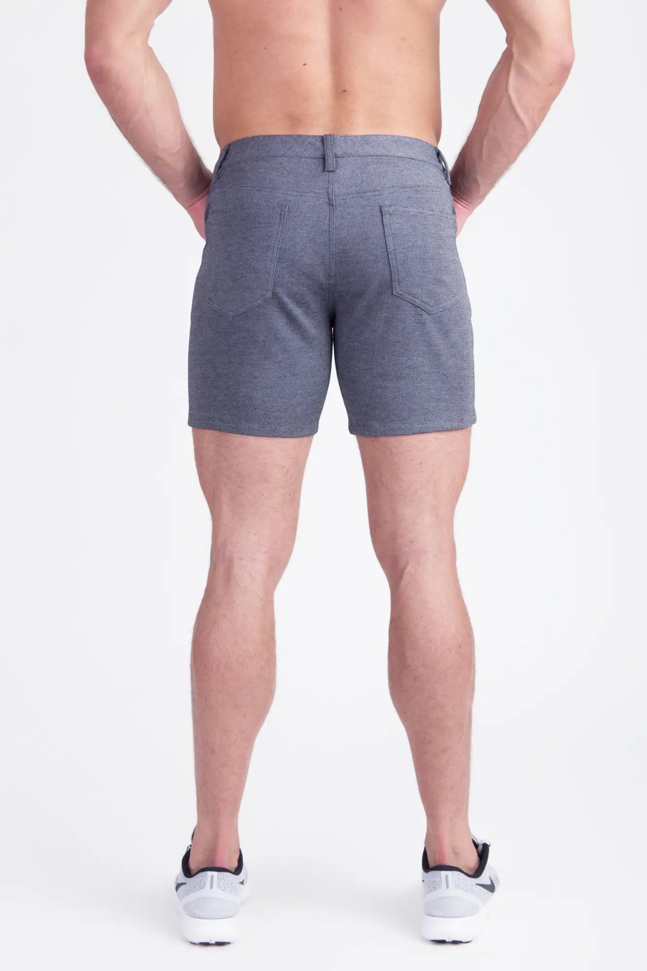 Gray heathered cotton stretch knit shorts with a classic five-pocket design and belt loop waistband