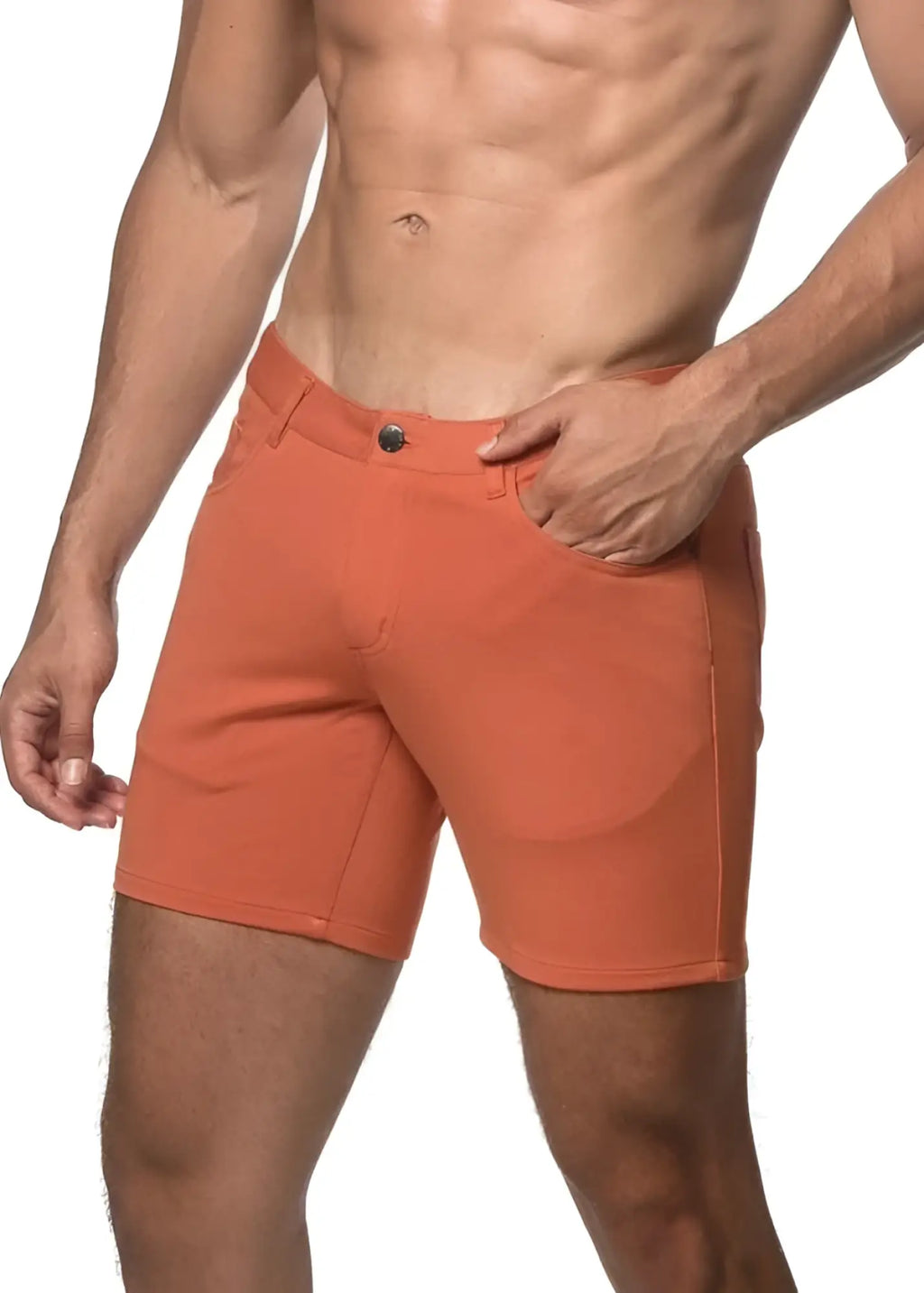 Orange stretch knit short athletic shorts with button closure and side pockets made of breathable fabric