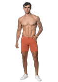 Orange stretch knit shorts with button closure and belt loops made from soft stretch fabric for comfortable wear