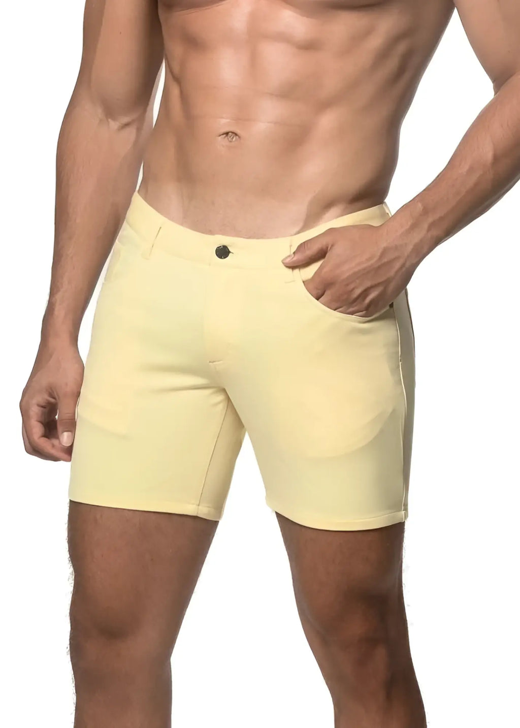 A pair of pale yellow stretch knit shorts with a classic button closure and side pockets in form-fitting style