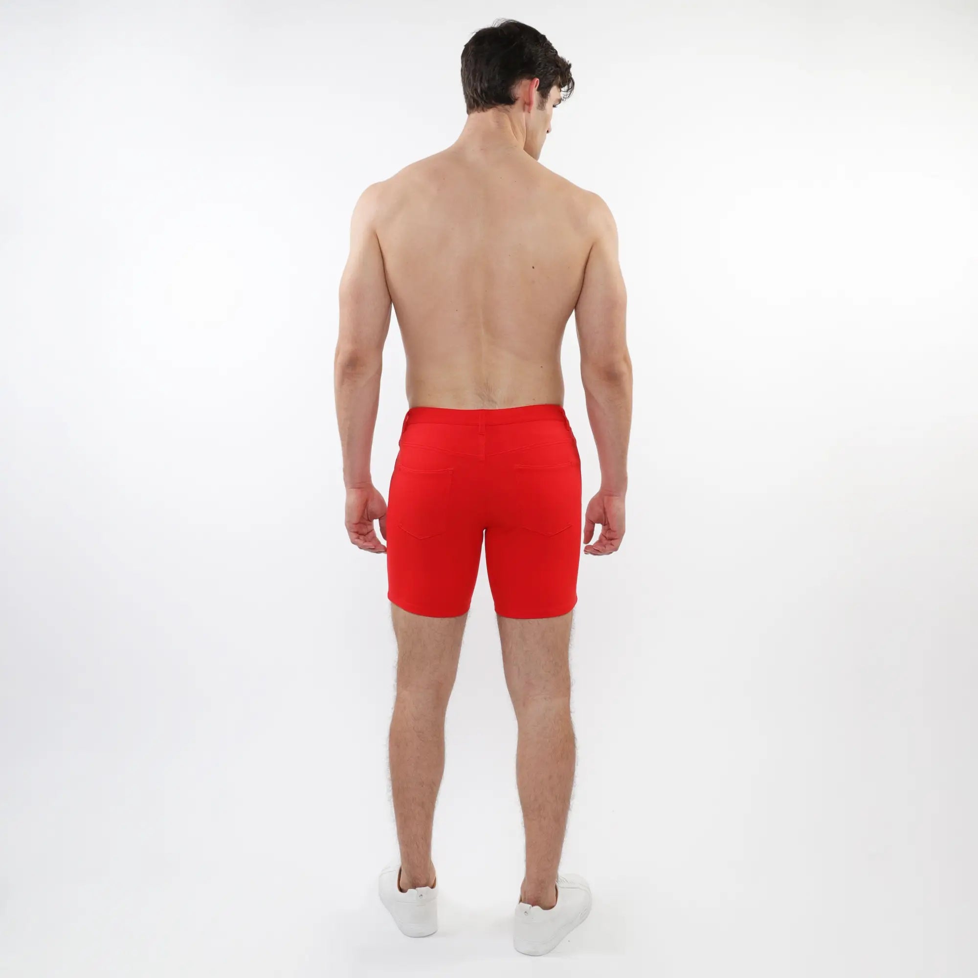 Red stretch knit short with snug fit and elastic waistband made from breathable athletic fabric