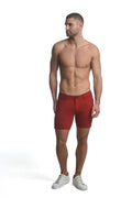 Red men’s stretch knit shorts with classic fit and button closure made of stretchy knit fabric