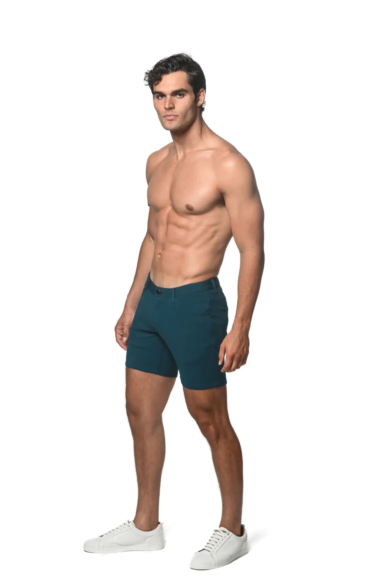 Teal stretch knit shorts with a tailored fit and sleek modern design for comfortable stylish wear