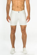 White stretch knit short with sleek modern design and subtle stitching details in athletic shorts style