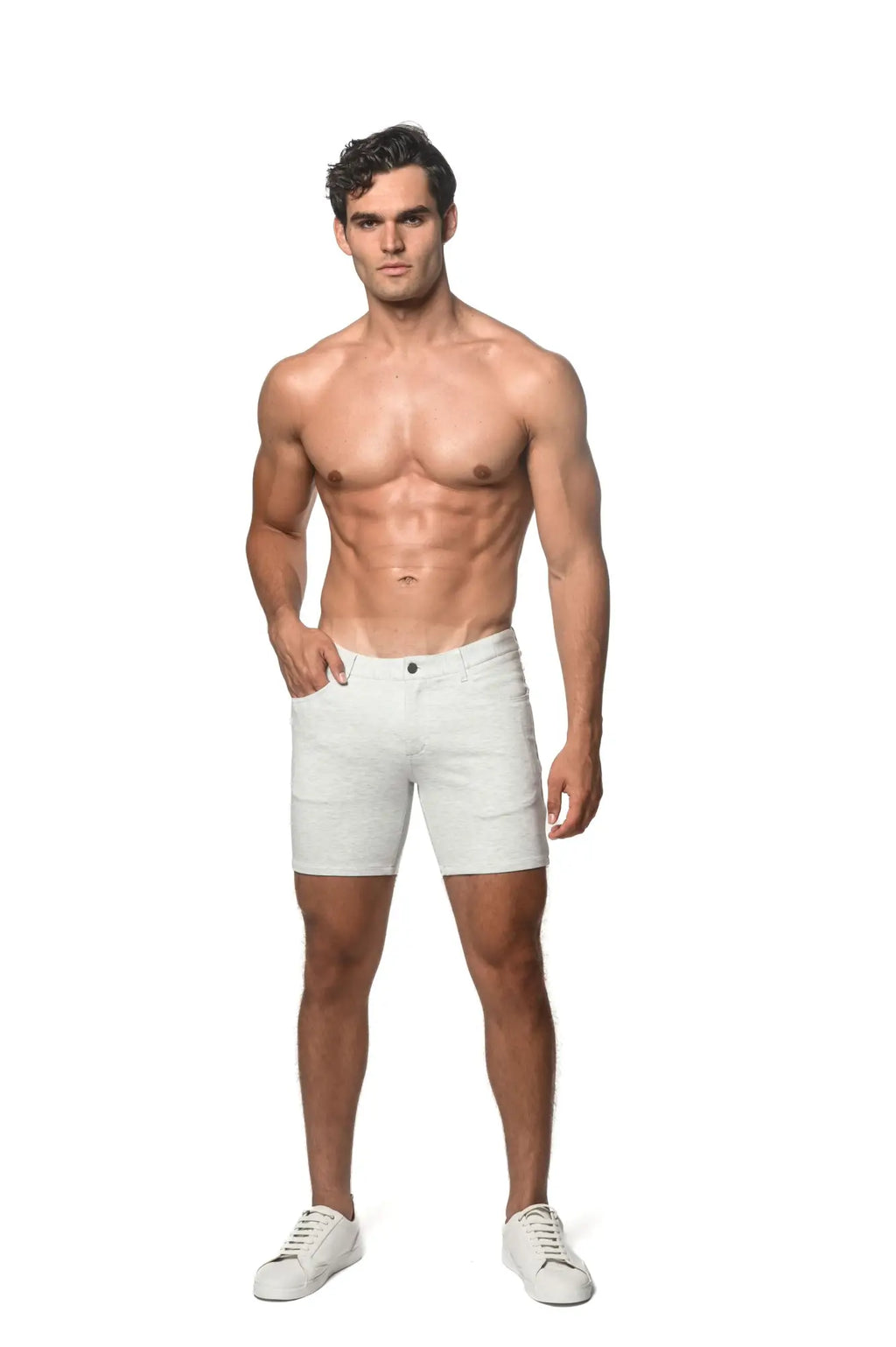 White stretch knit short denim shorts with classic five-pocket design and button closure in white color