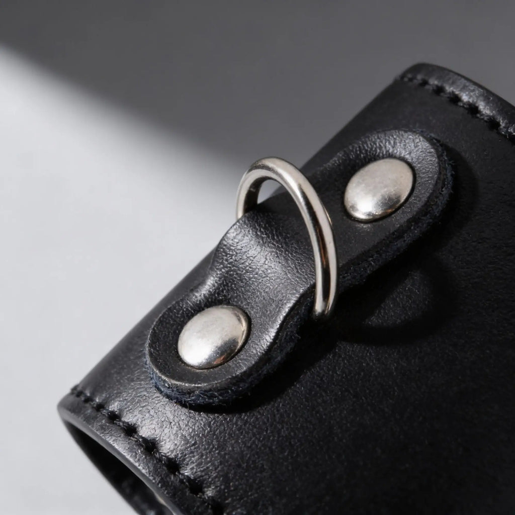 Strict 2 Inch Ball Stretcher in black leather with a silver D-ring attached by two silver rivets.
