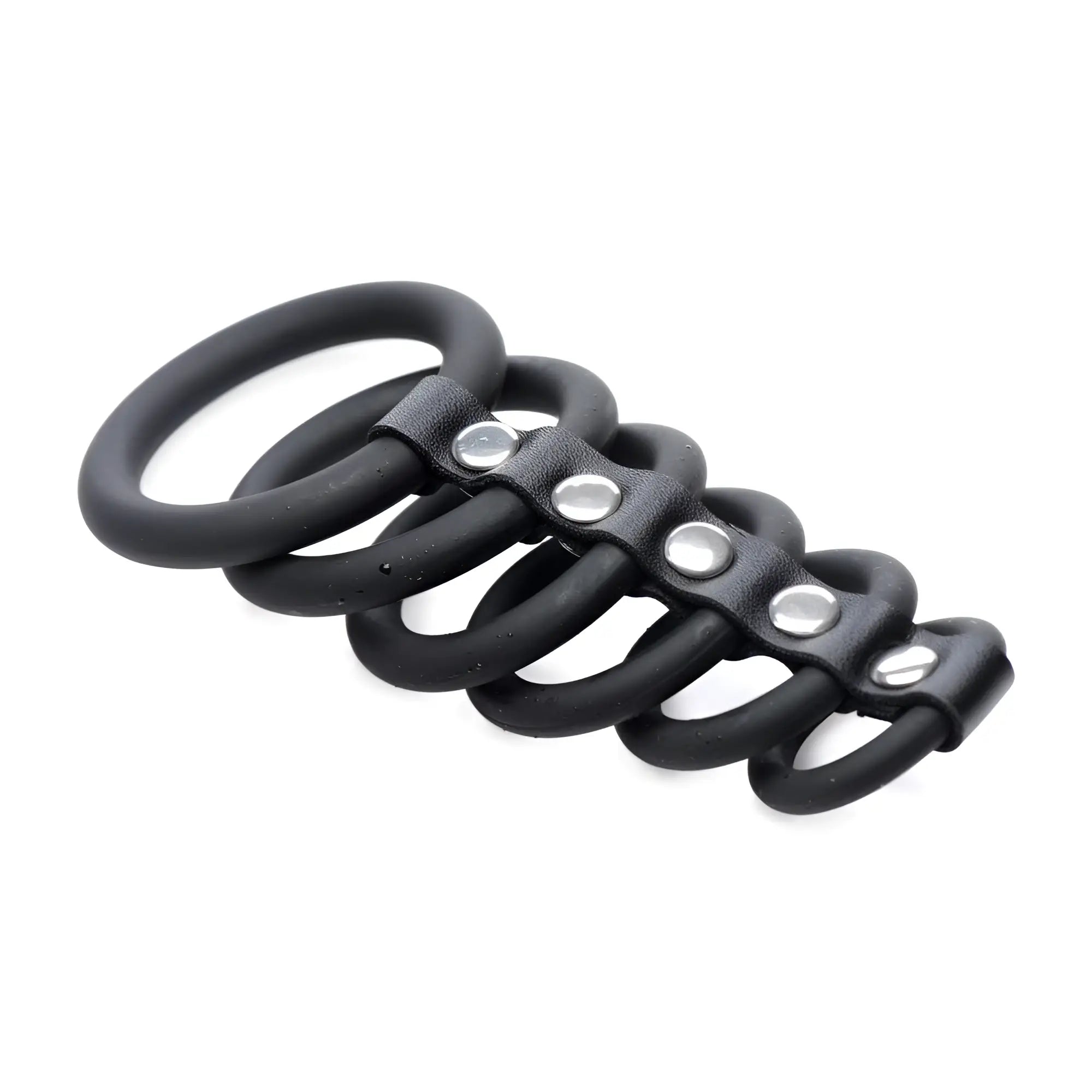 Strict 6 Ring Silicone Chastity Cage: a black silicone 6-ring device linked by a studded leather-style strap.
