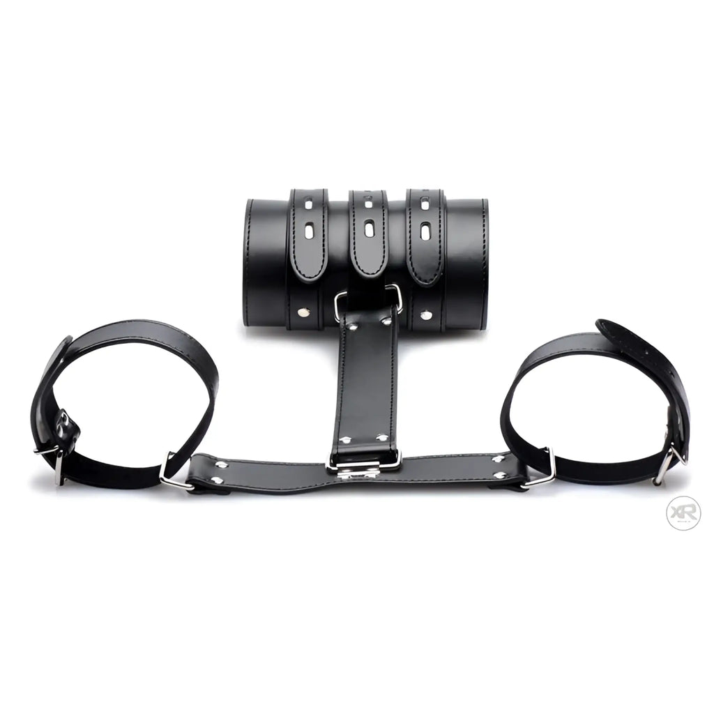 Strict Armbinder in black leather, featuring a central cuff connected to two side wrist straps with metal hardware.
