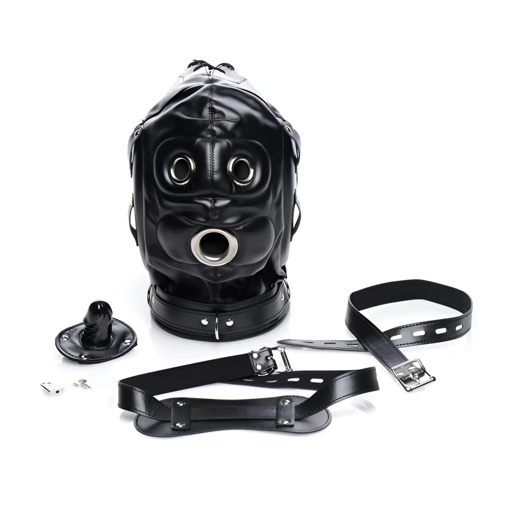 Black leather bondage hood with metal-rimmed eye and mouth openings, plus a matching penis gag and adjustable straps.