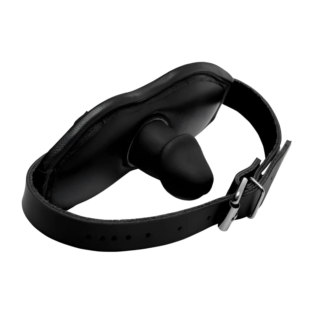 Strict Cock Head silicone mouth gag with a black adjustable leather-style head strap and silver buckle.