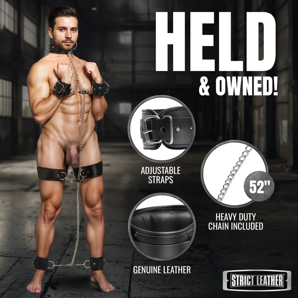 Strict Leather bondage set on a man, featuring adjustable black leather cuffs and a heavy-duty 52-inch steel chain.