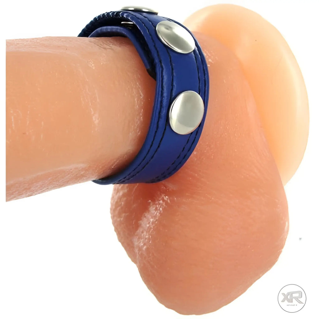 Cobalt blue leather cock ring with silver speed snaps, designed for men.