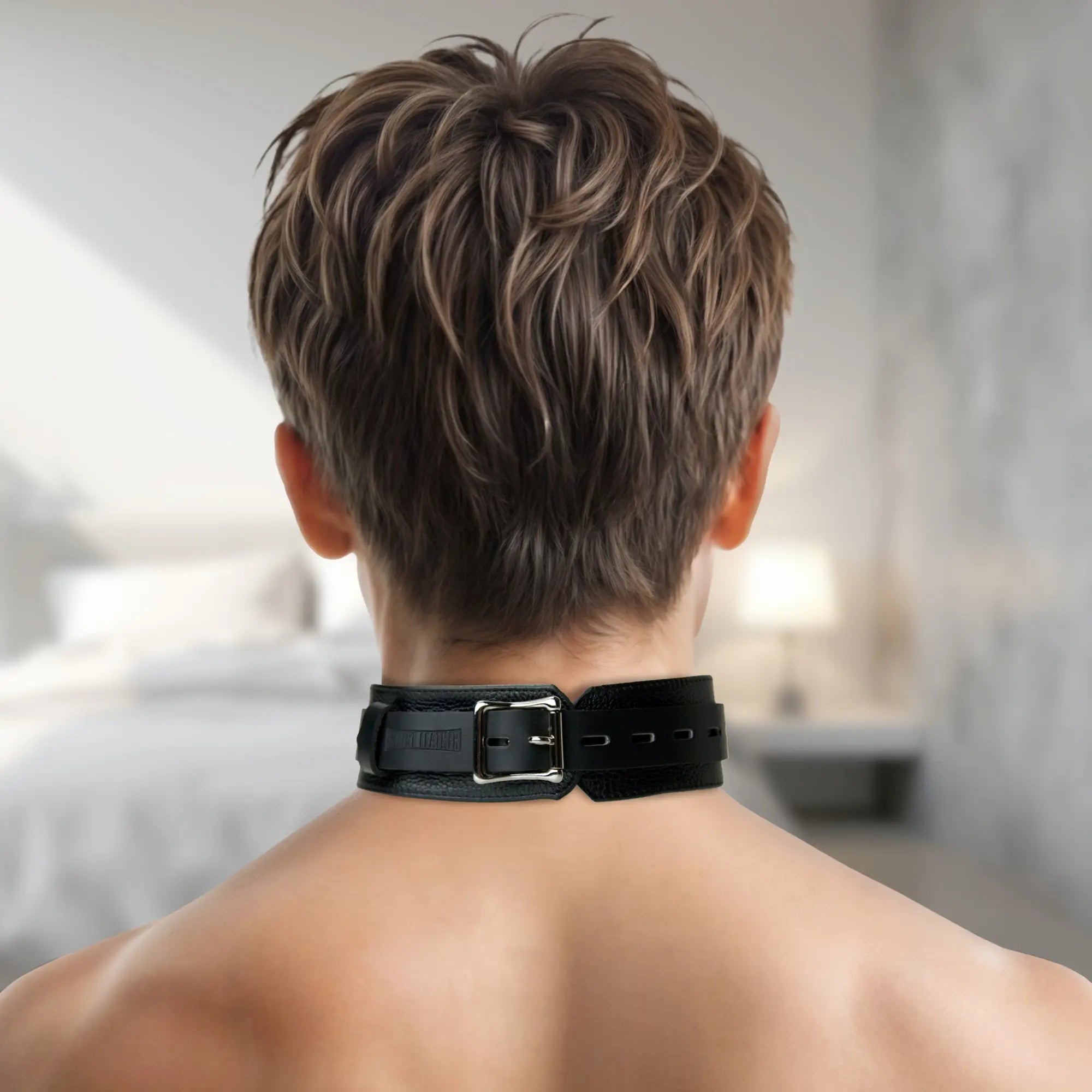 Strict Leather Deluxe Locking Collar: A black leather collar with a silver buckle worn around a person's neck.