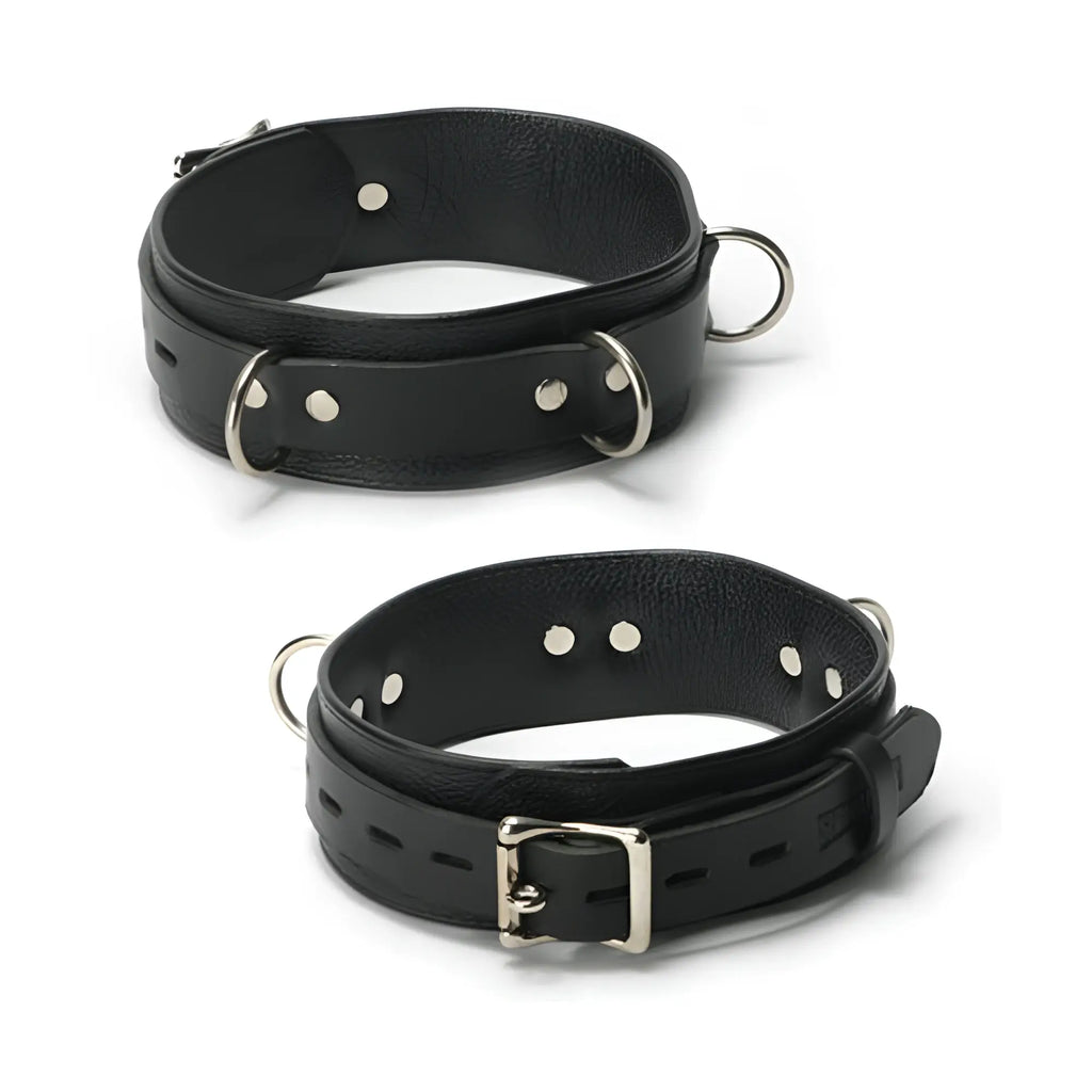 Strict Leather Deluxe Locking Collar: two black leather collars featuring silver buckles and metal D-ring attachments.