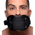 Strict Leather padded silicone penis mouth gag, featuring a black adjustable leather strap worn over a person's mouth.