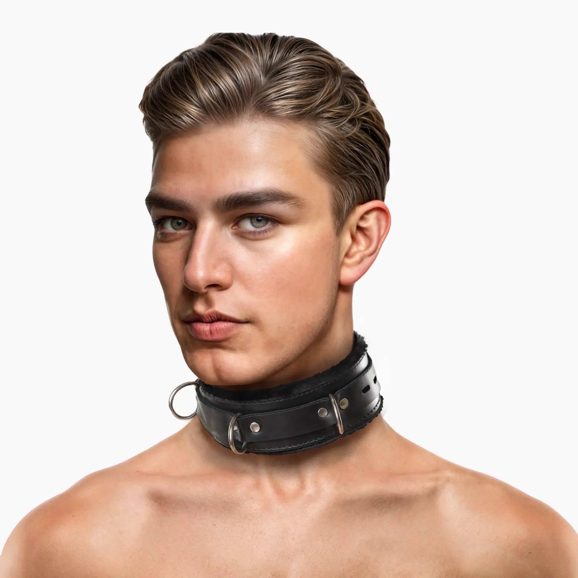 A man wearing a black leather, fur-lined Strict Leather locking collar with metal D-rings on a white background.