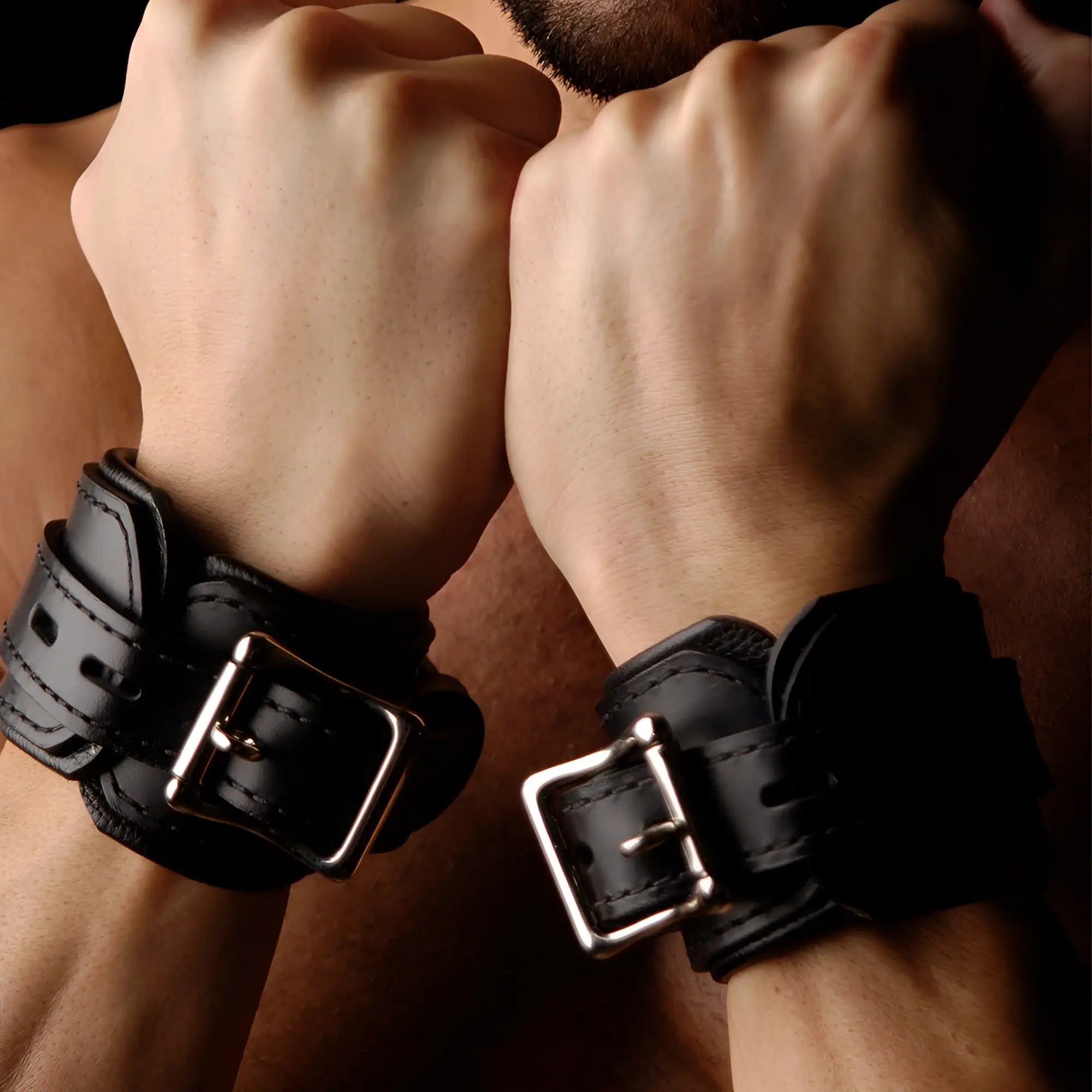 Strict Leather Premium Locking Cuffs: pair of black leather wrist cuffs with silver metal buckle closures.