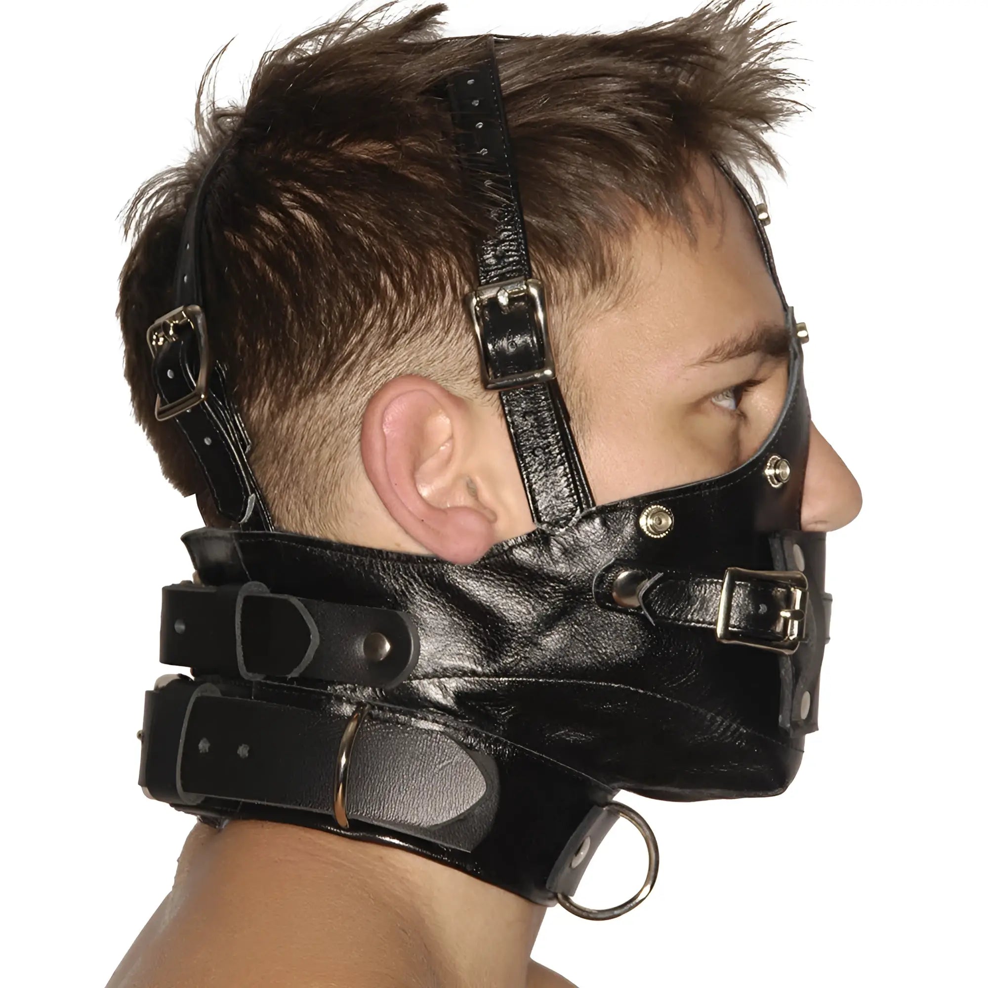 Strict Leather premium black leather muzzle and collar with silver hardware, shown from a side profile on a person.