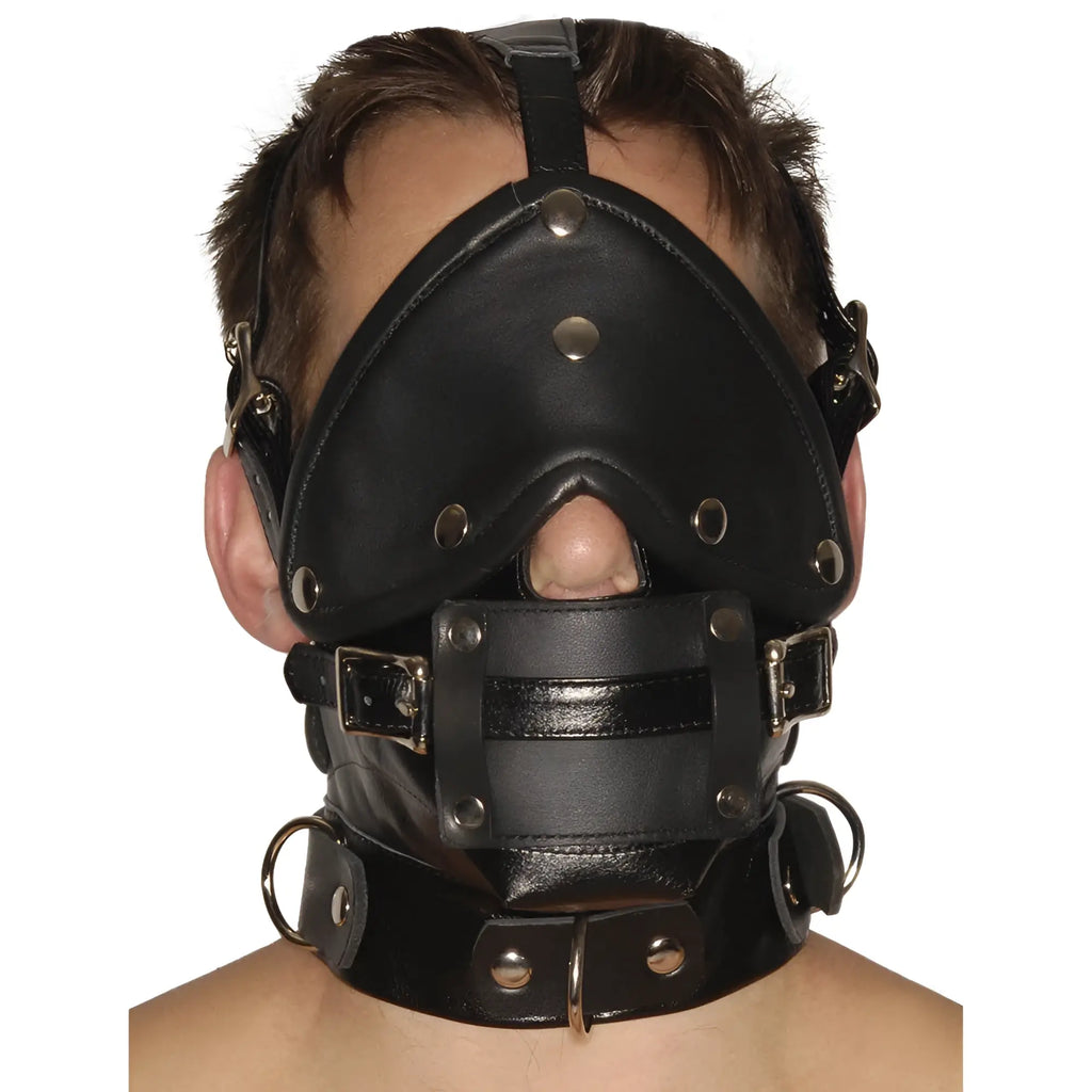 Strict Leather Premium black leather muzzle with adjustable straps, integrated blindfold, mouth gag, and neck collar.