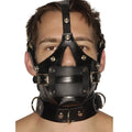 Strict Leather Premium Muzzle: A black leather head harness featuring an integrated gag, nose cutout, and neck collar.