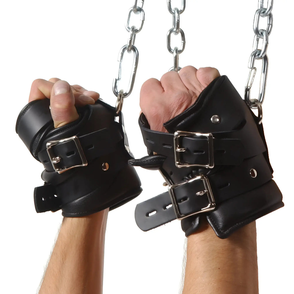 Strict Leather Premium Suspension Wrist Cuffs: two black leather cuffs with silver buckles, attached to hanging chains.