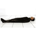 Strict Leather Sleepsack: A man lies flat on a white tiled floor, fully enclosed in a black leather lace-up sleepsack.