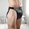 Strict Leather Confinement Jockstrap: Black leather jockstrap with adjustable buckle and front locking zipper mechanism.