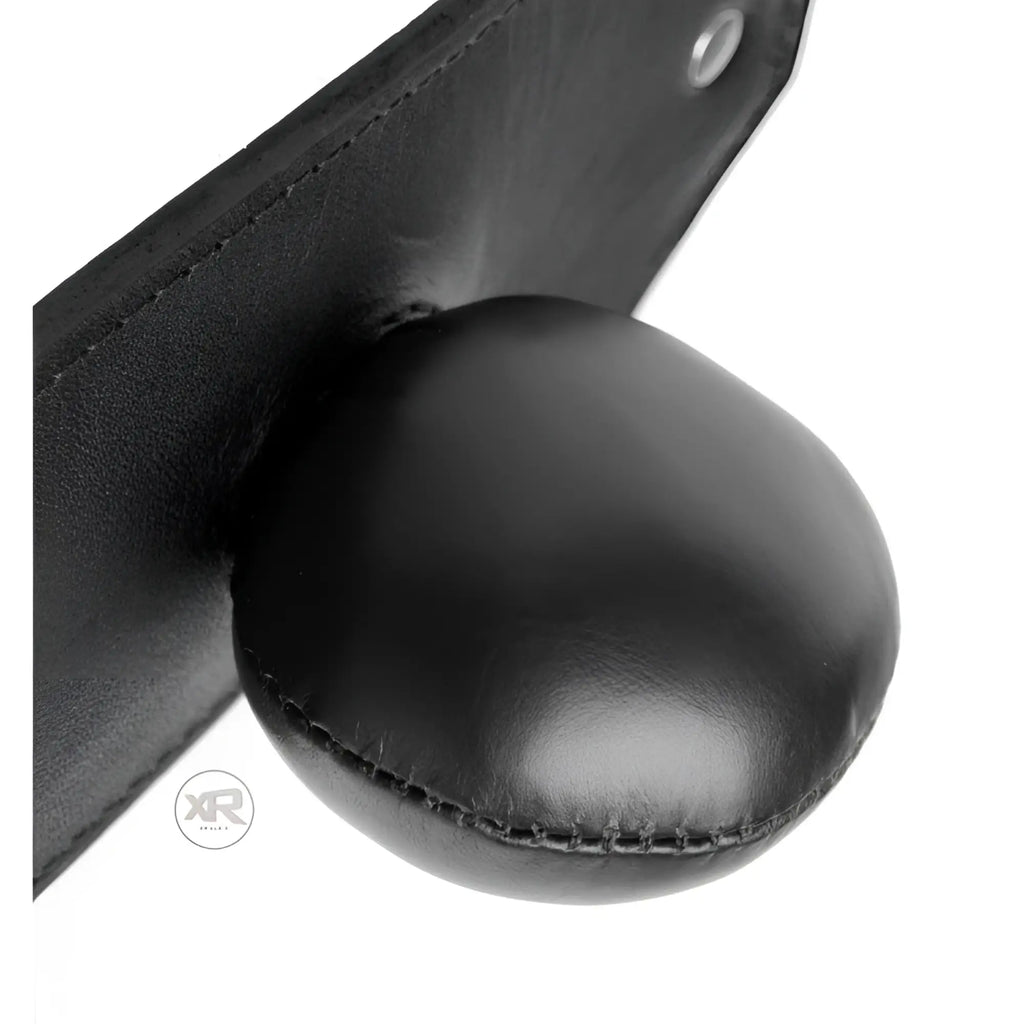 Strict Leather Stuffer mouth gag featuring a smooth black leather ball attached to a flat leather strap.