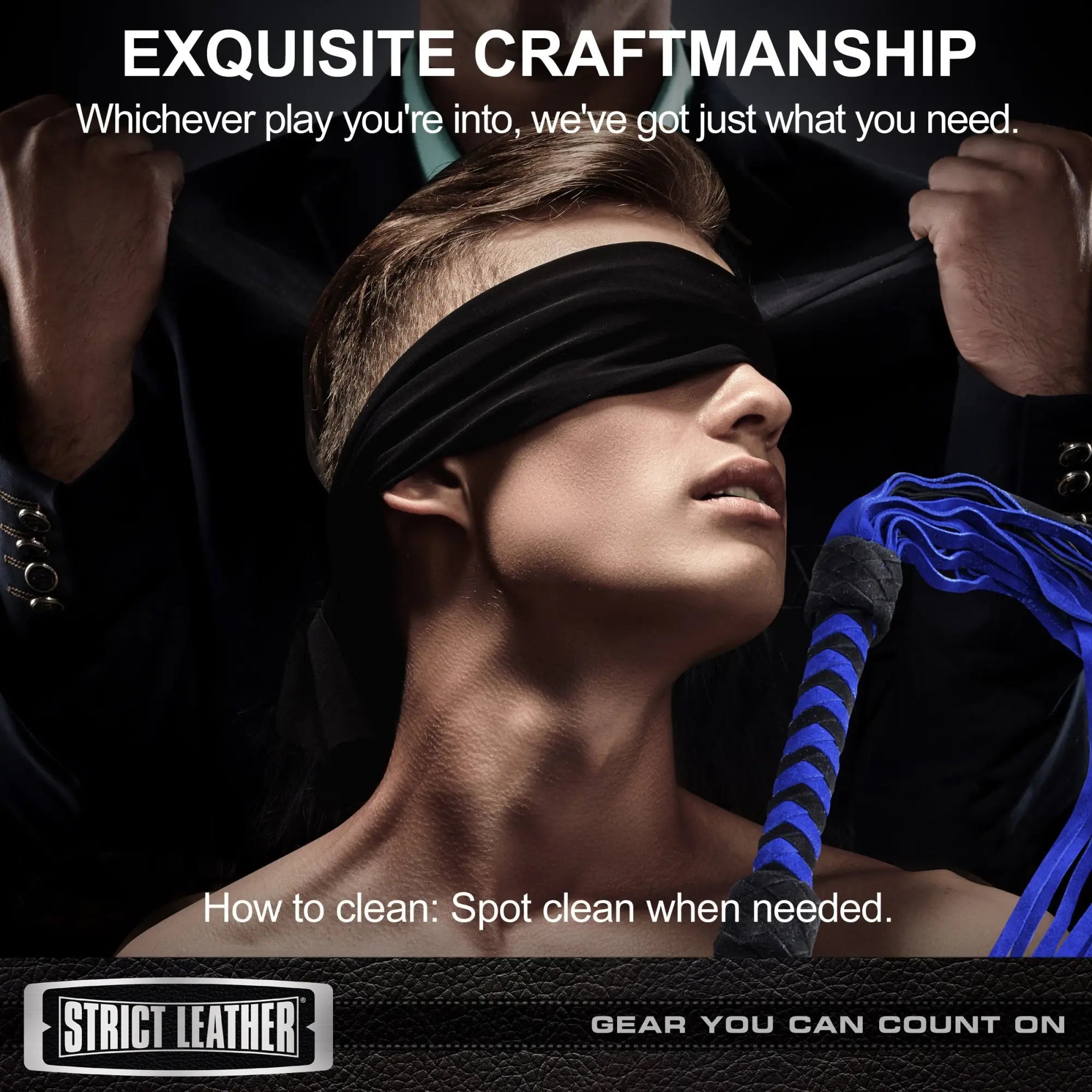 Strict Leather suede flogger with a black and blue braided handle and blue tails, held behind a blindfolded person.