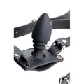 Strict Male Cock Ring Harness featuring a matte black silicone anal plug attached to textured black leather straps.