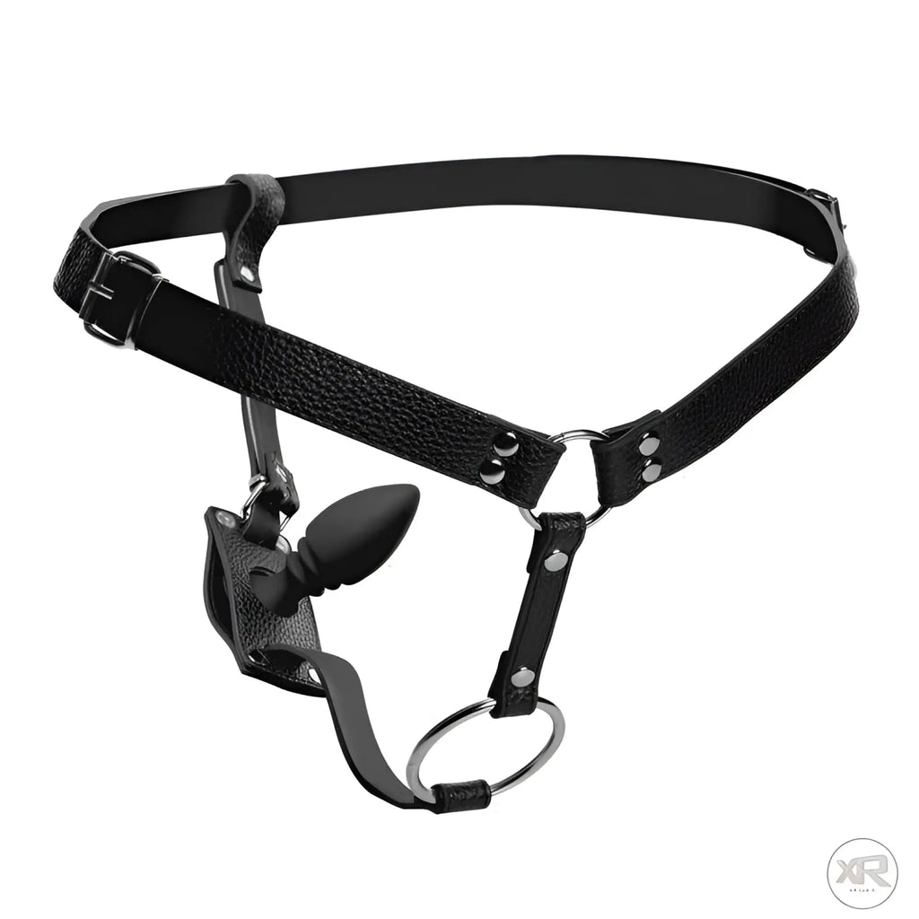 Strict Male Cock Ring Harness featuring a black textured faux leather design with a silicone anal plug and metal rings.