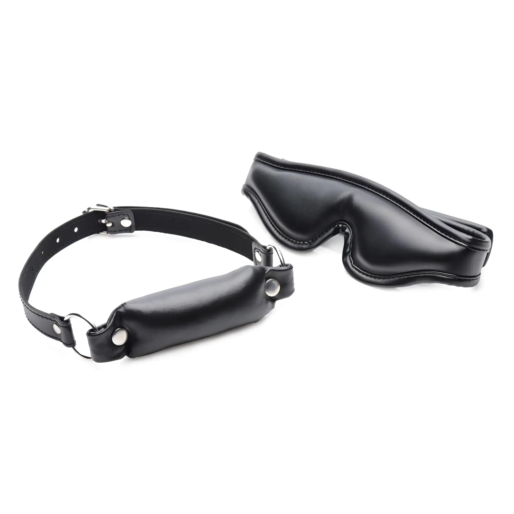 Strict Padded Blindfold and Gag Set in black faux leather with buckle straps and metal hardware on a white background.