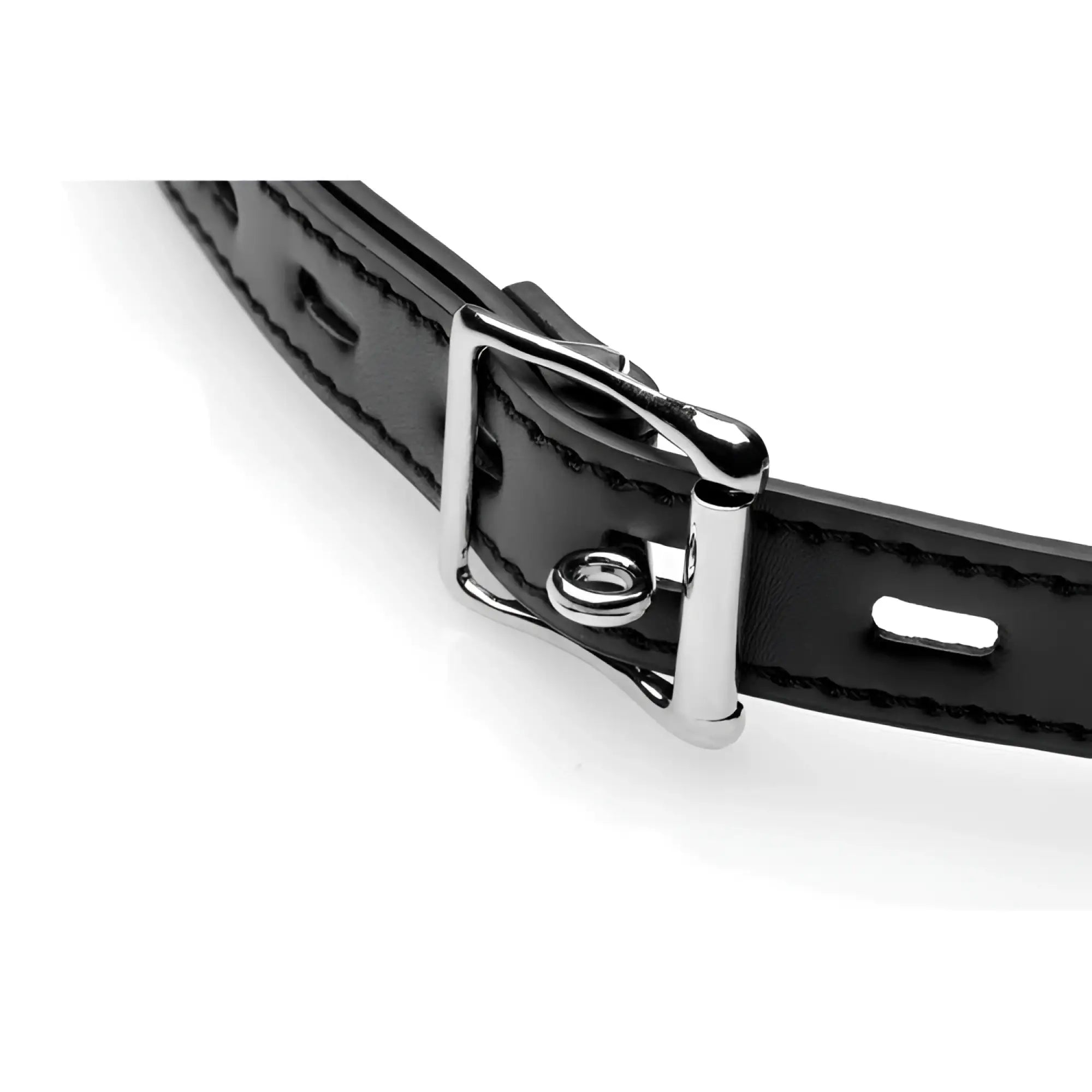 Strict Silicone Ball Gag with Nipple Clamps: Close-up of a black leather-style strap with a silver metal buckle.