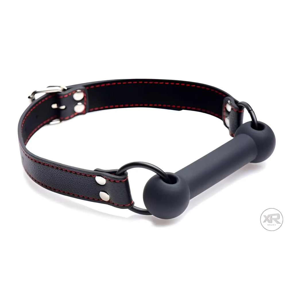Strict Silicone Bit Gag: A black leather collar with red stitching, silver hardware, and a matte black silicone bar bit.