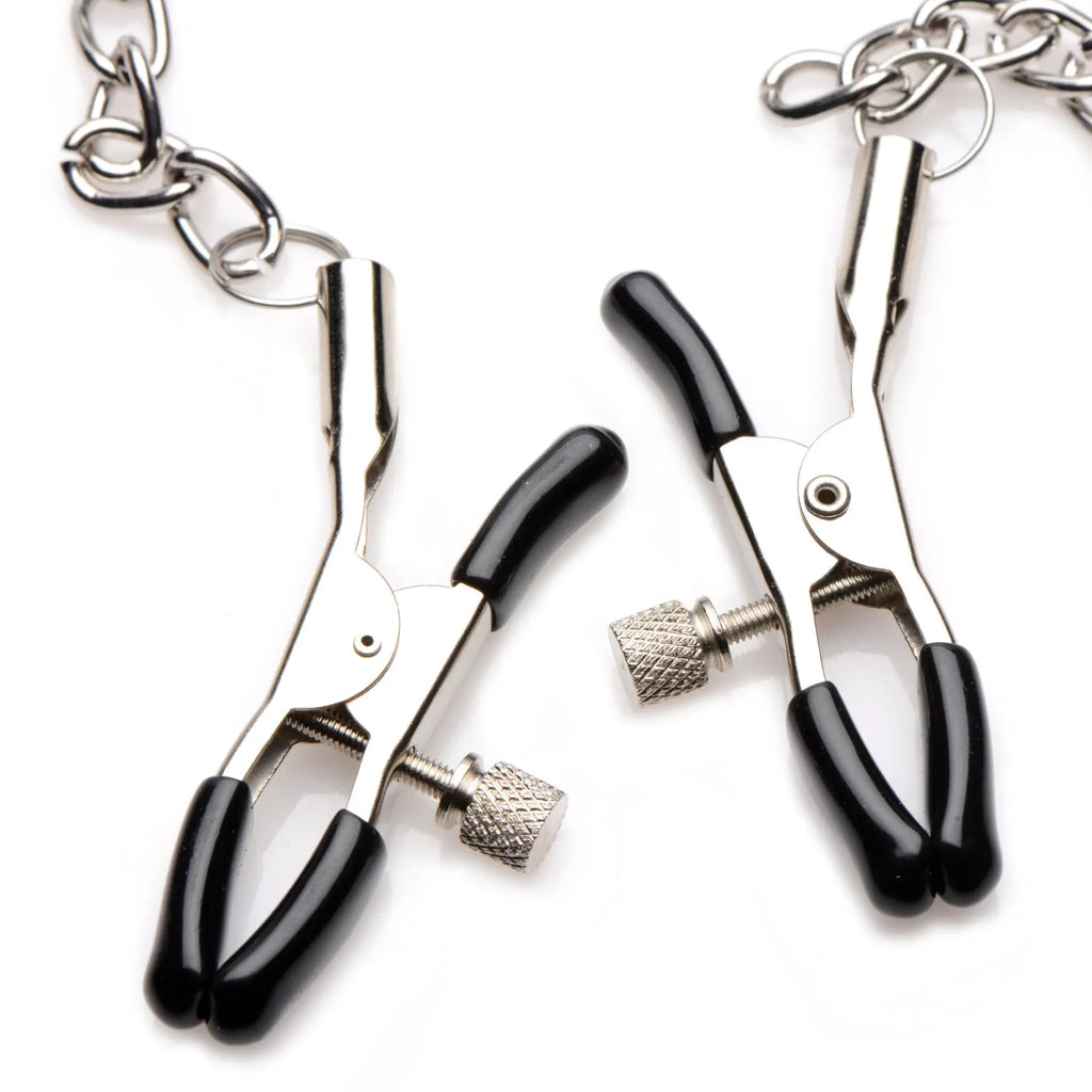 Strict Silicone Nipple Clamps with silver-tone metal construction, adjustable tension screws, and attached silver chains.