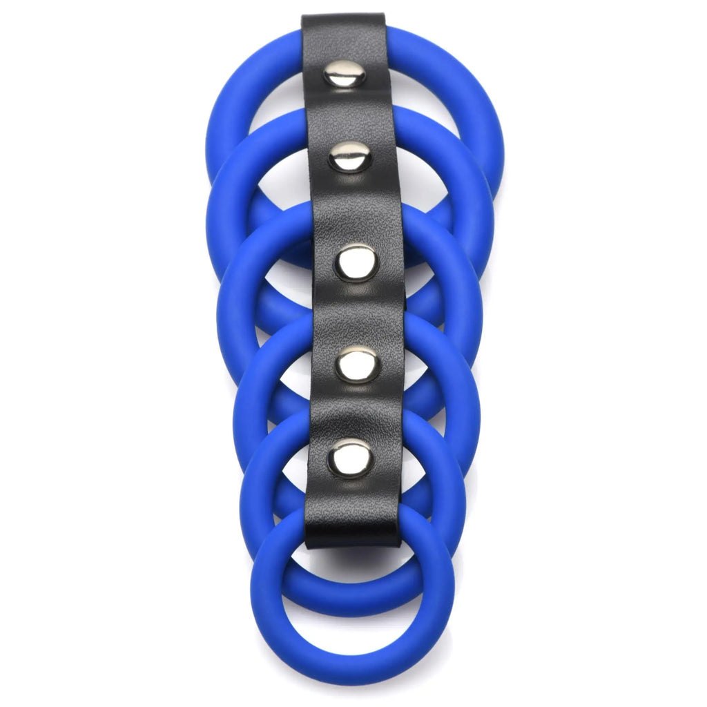 Strict Silicone Gates of Hell device with five blue silicone rings attached to a black leather strip with silver studs.