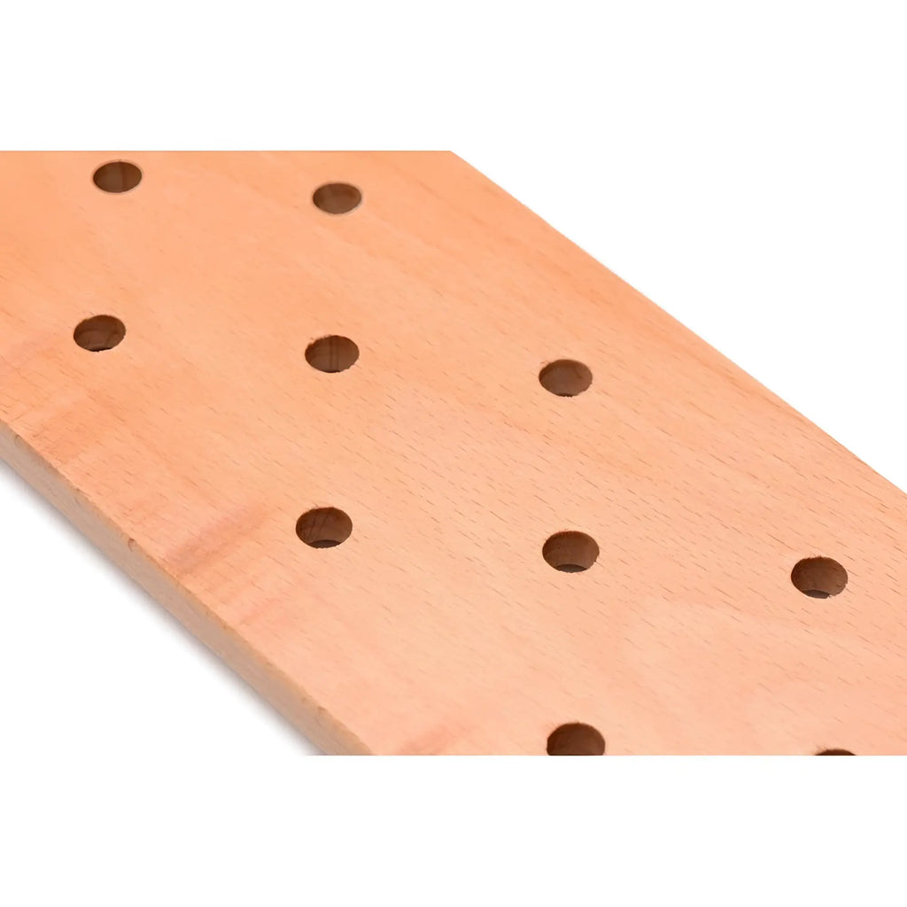 Strict Wooden Paddle, a light-toned wood paddle featuring a grid of evenly spaced circular holes.
