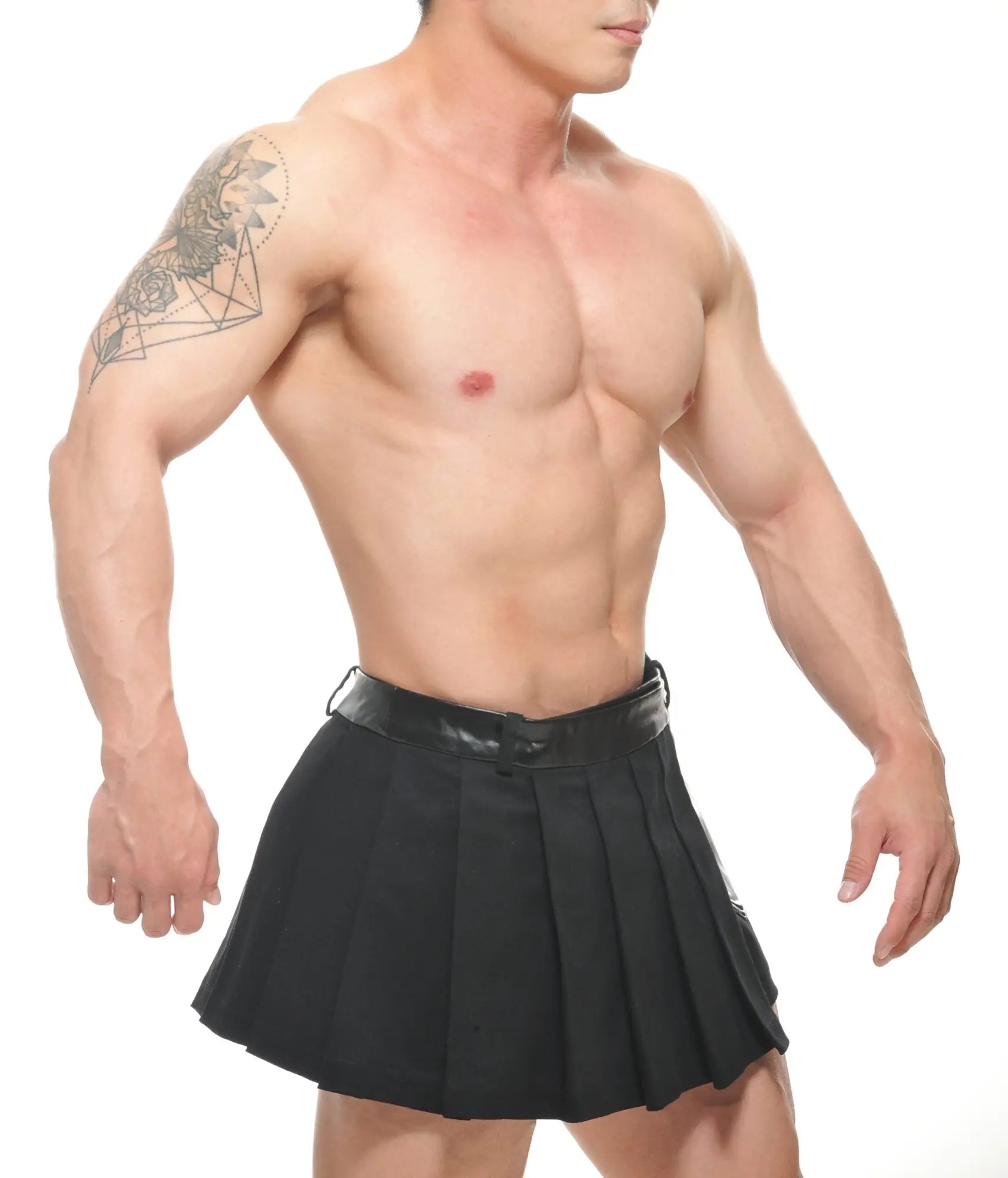 Black pleated skirt with shiny black belt from spar wrap skirt collection made of lightweight fabric