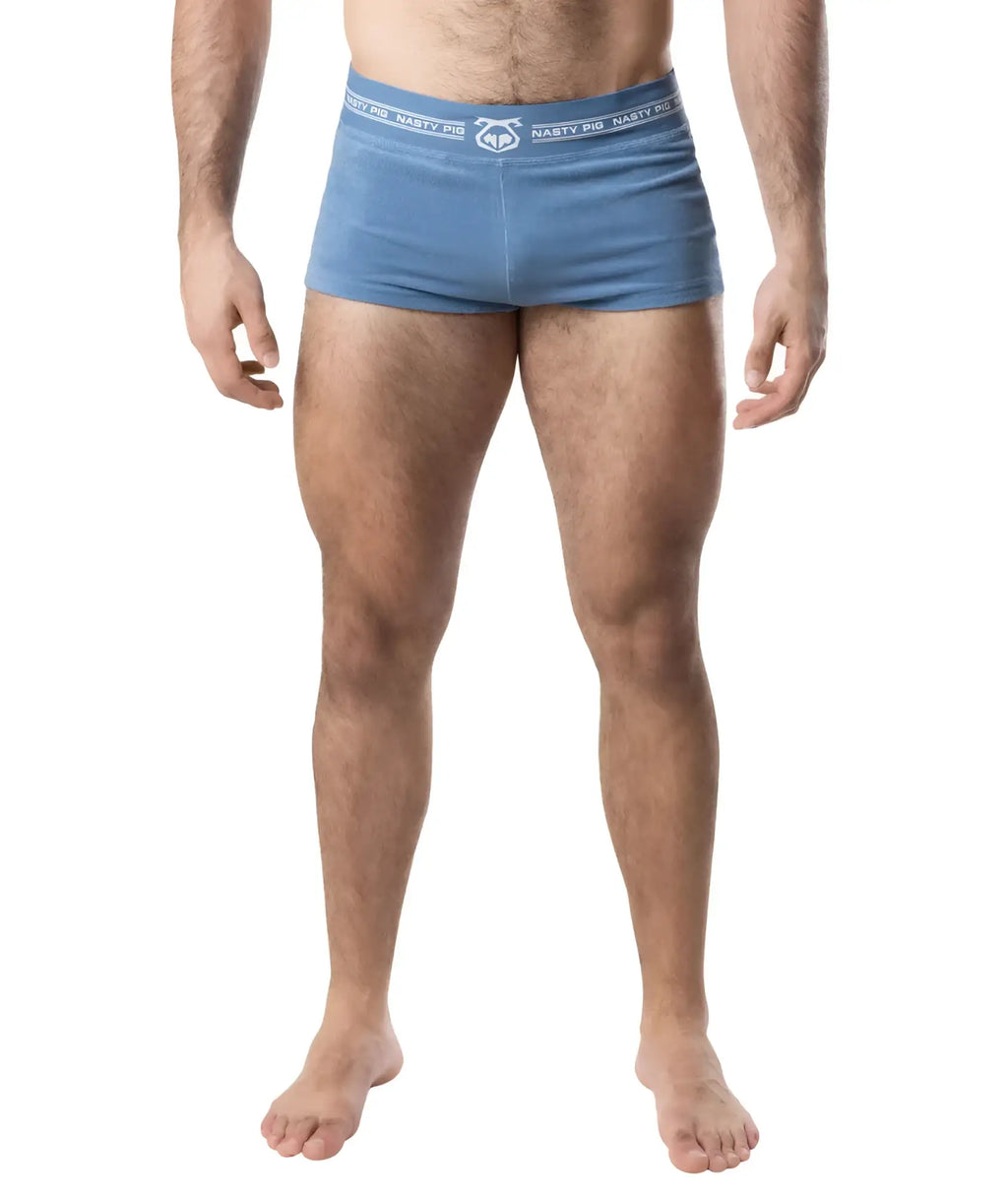 Blue nasty pig boxer briefs with white logo band featured in the suite trunk short product line