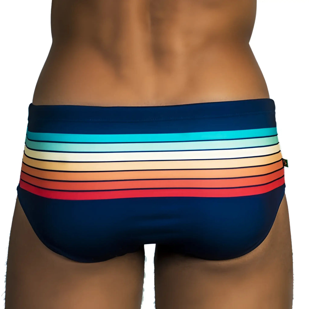 Navy blue men’s designer swim trunks with horizontal rainbow stripes sunset sunga for stylish beachwear