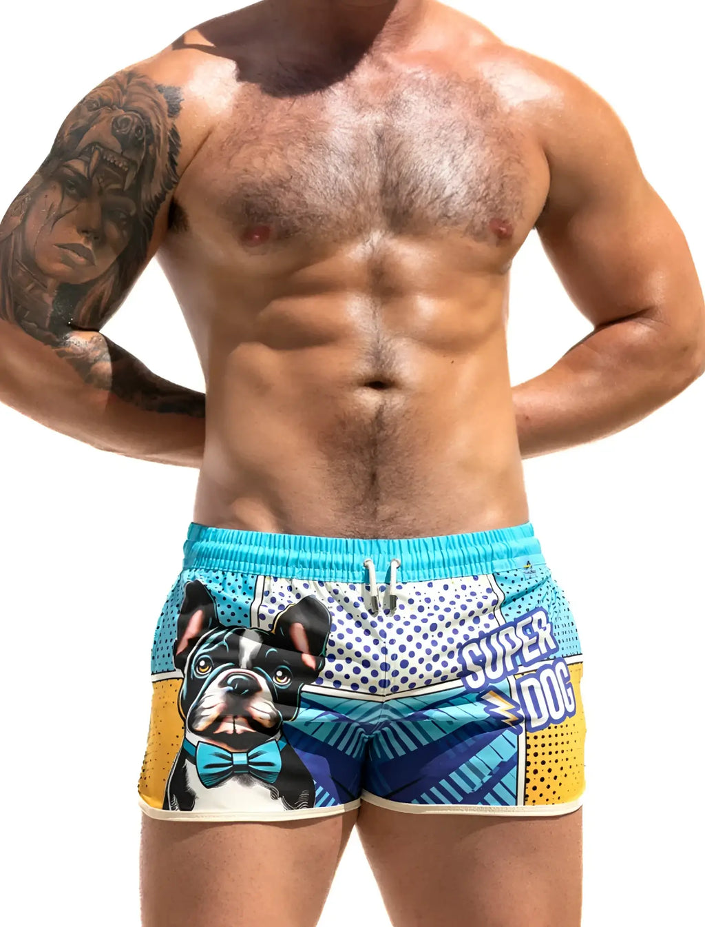 Bright turquoise and yellow super dog swim shorts with a cartoon french bulldog wearing a bow tie and bold blue text