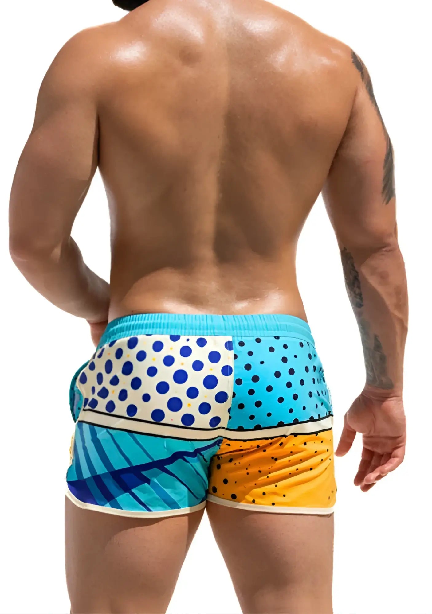 Super dog swim short vibrant patchwork swim trunks in turquoise white blue polka dots and yellow orange hues
