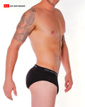 Black go softwear super padded butt briefs in black with white logo band showing the back side of the product