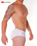 White men’s super padded butt briefs with sheer mesh side panel and subtle brand logo at the waistband