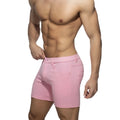 Pink men’s svelte shorts with tailored fit and classic denim-style design in cotton fabric