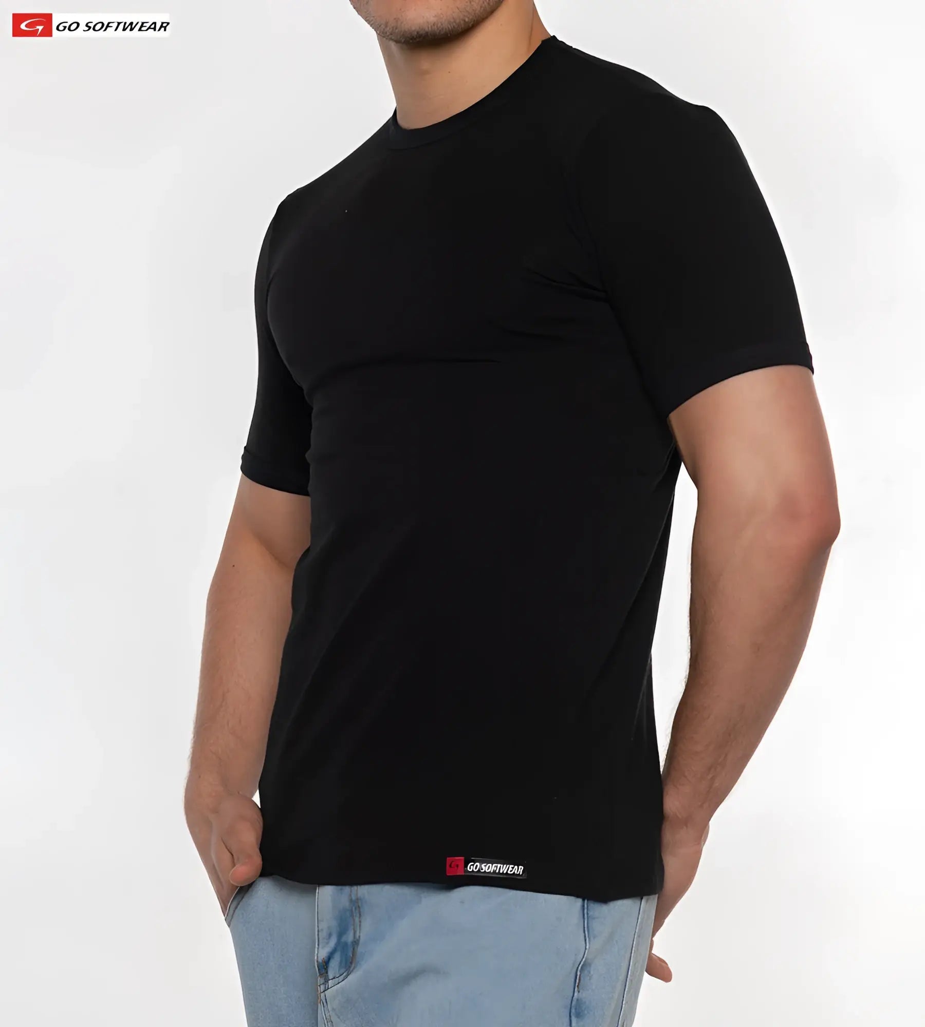 Black no sweat tee short-sleeved crew neck t-shirt with subtle ribbed texture and small red logo tag at bottom hem